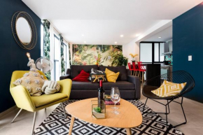 Vibrant Tropical Pent House with Rooftop Patio